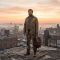 Man standing firm in harsh conditions symbolizing resilience over toughness